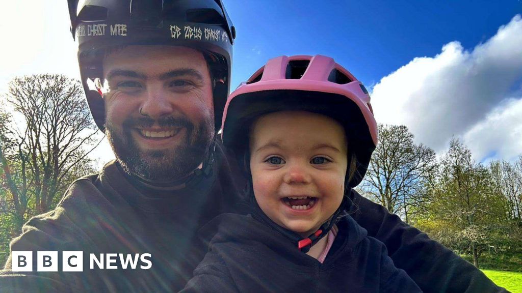 Dad captures heart-warming bike ride with daughter in viral video