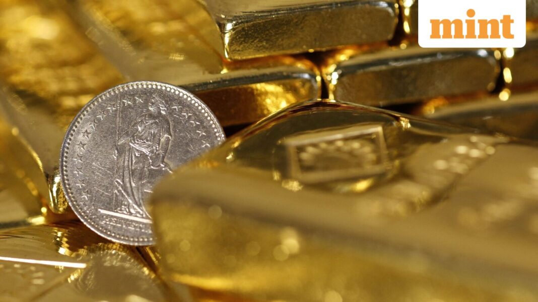 Gold, silver rates today: Comex gold and silver prices fall as Middle East tensions spark Fed rate hike fears | Stock Market News